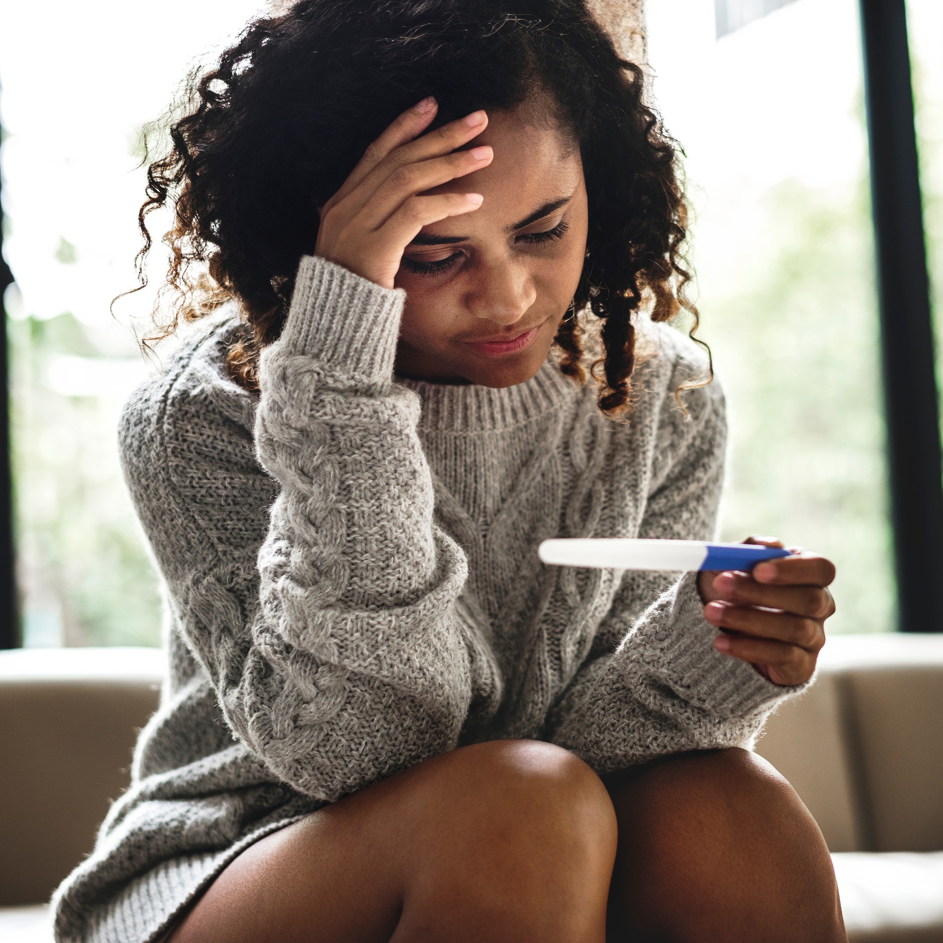 A woman searching online "Is Abortion Legal in Pennsylvania?"